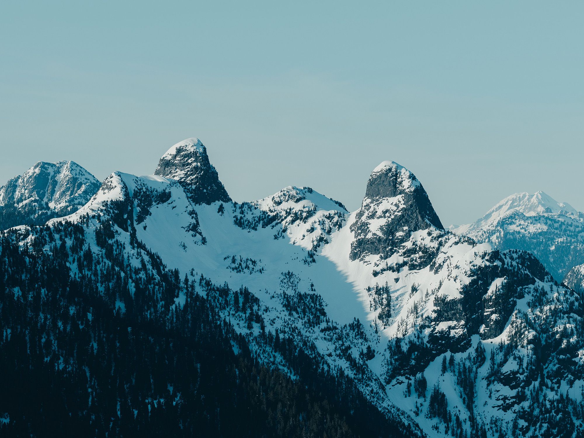 View from top of Mt. Strachan looking at the Lions peaks.