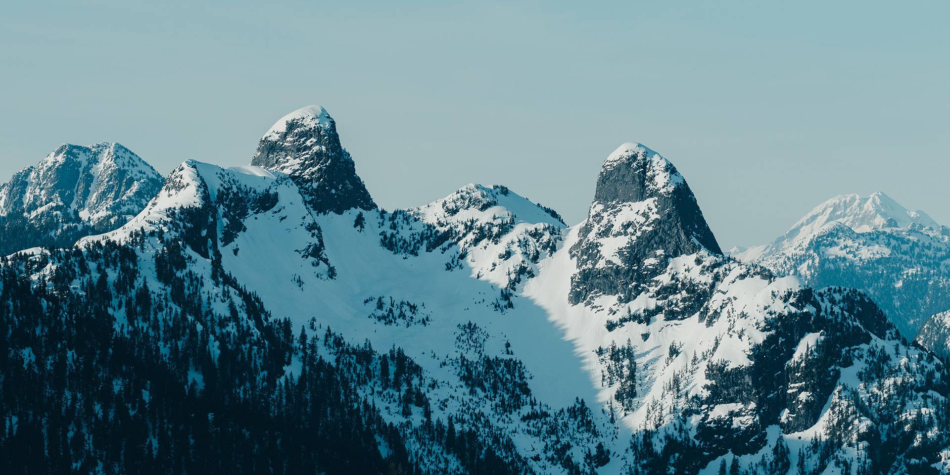 View from top of Mt. Strachan looking at the Lions peaks.