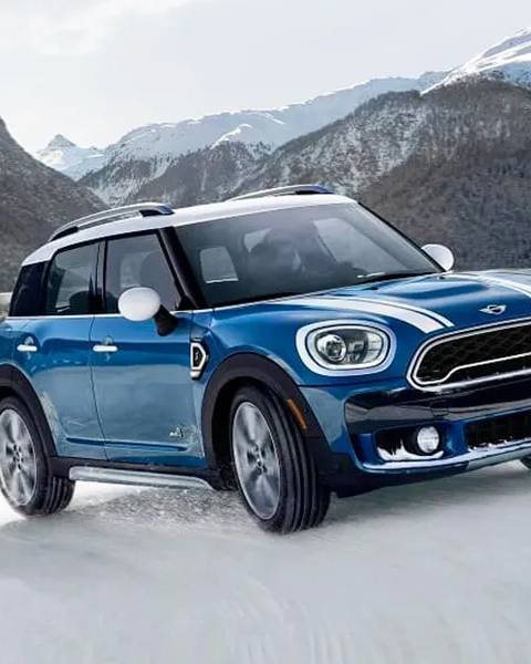 A Mini Cooper on snow.