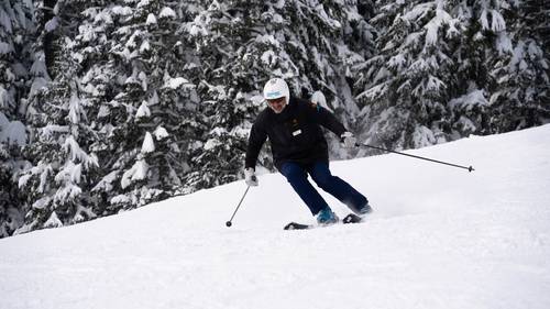 sparc master skier on groomer