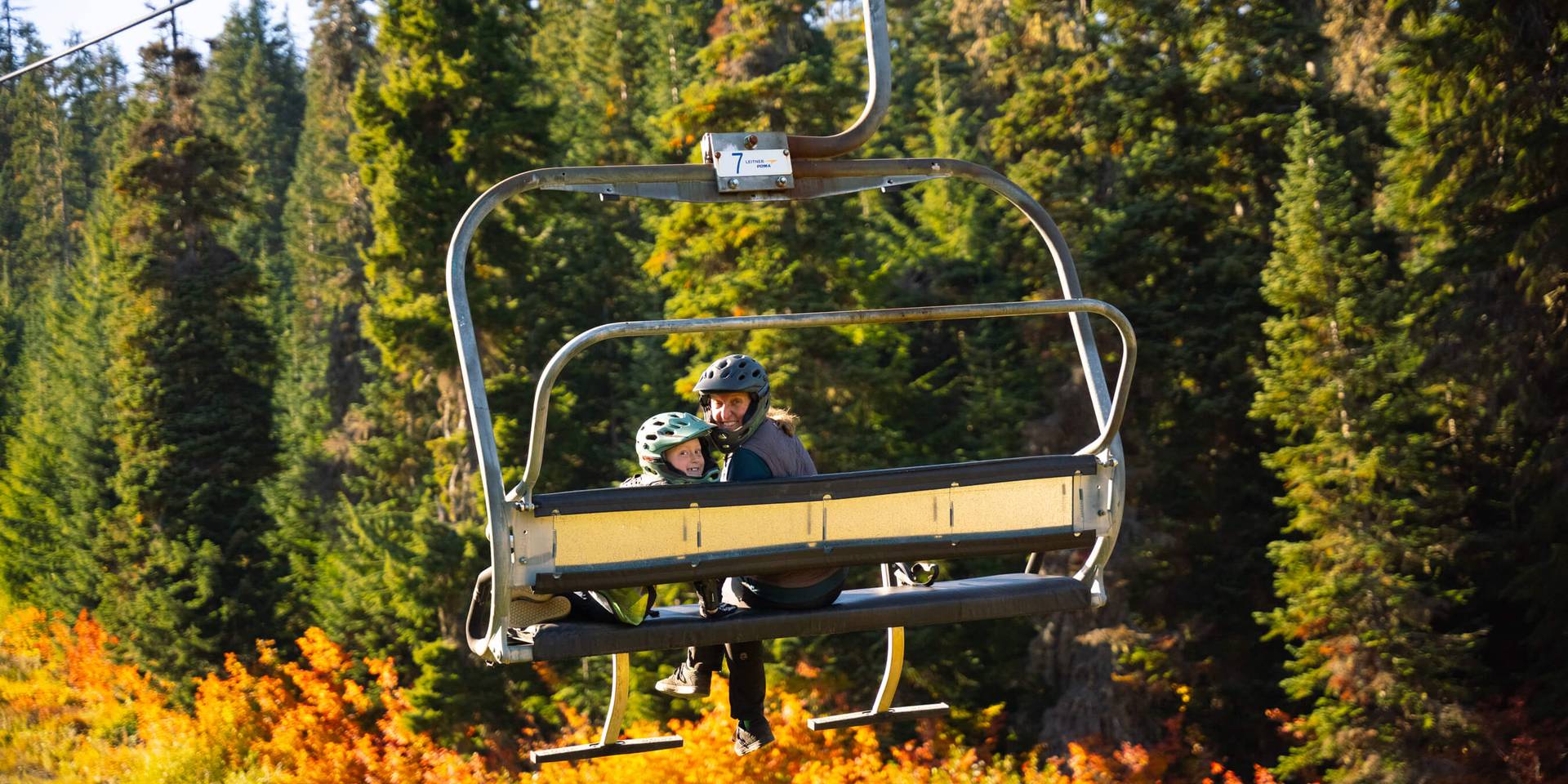 Fall colors gleam in the later summer sun on closing weekend of the Summit Bike Park