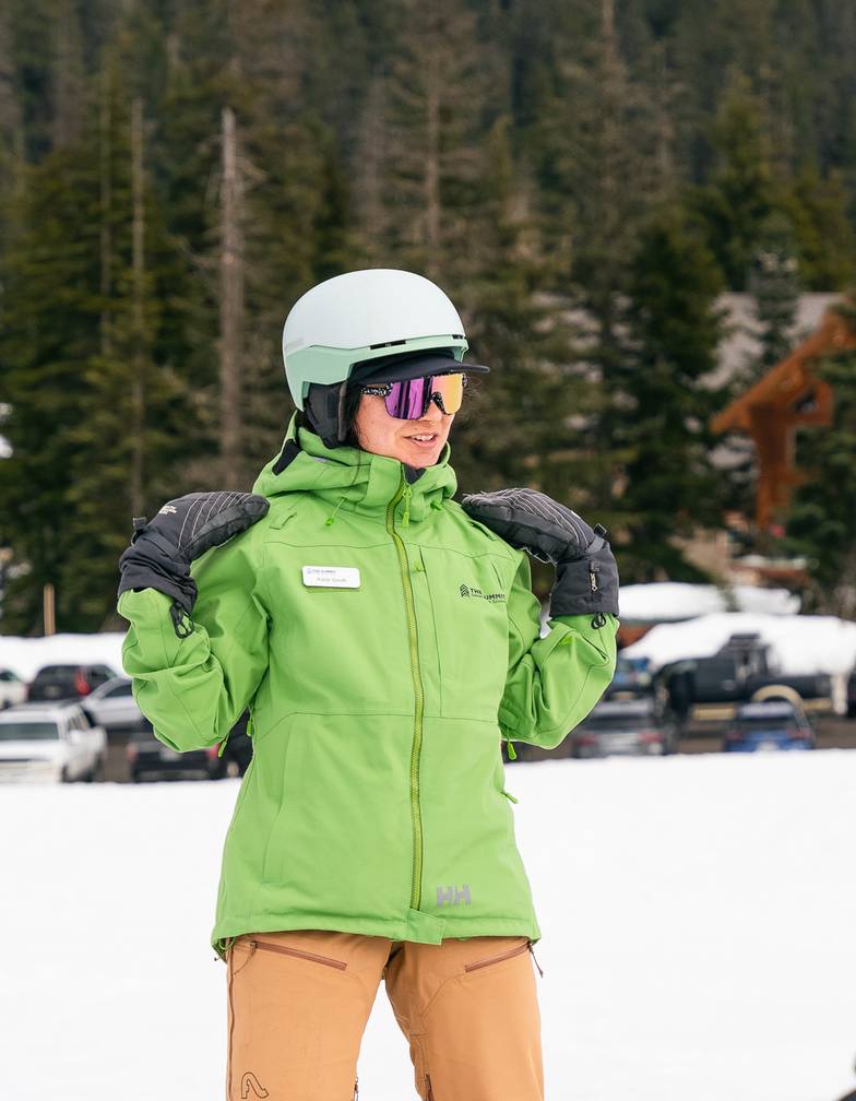 snowboard instructor talking to students