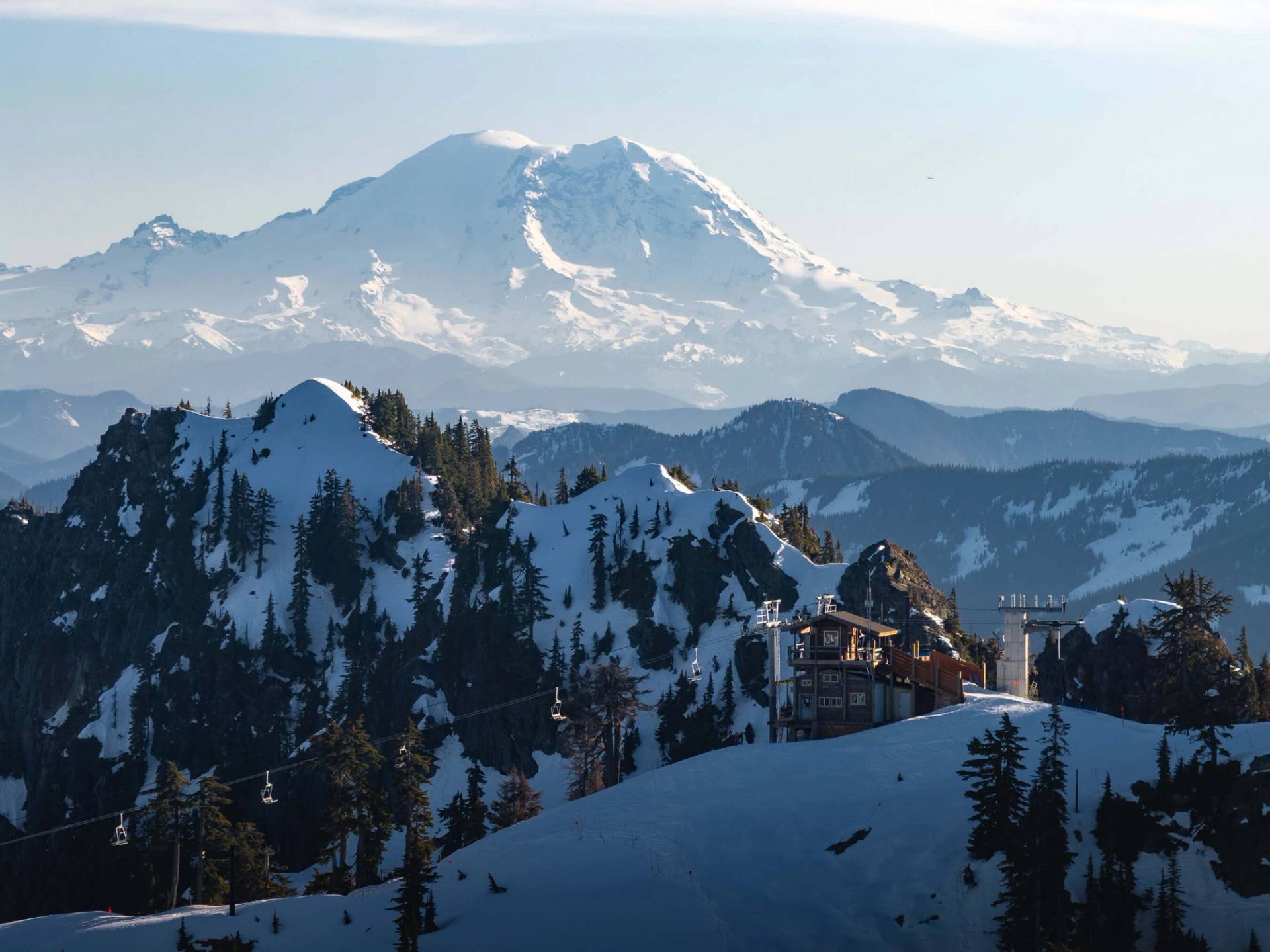 snowboarder getting air on their last lap
