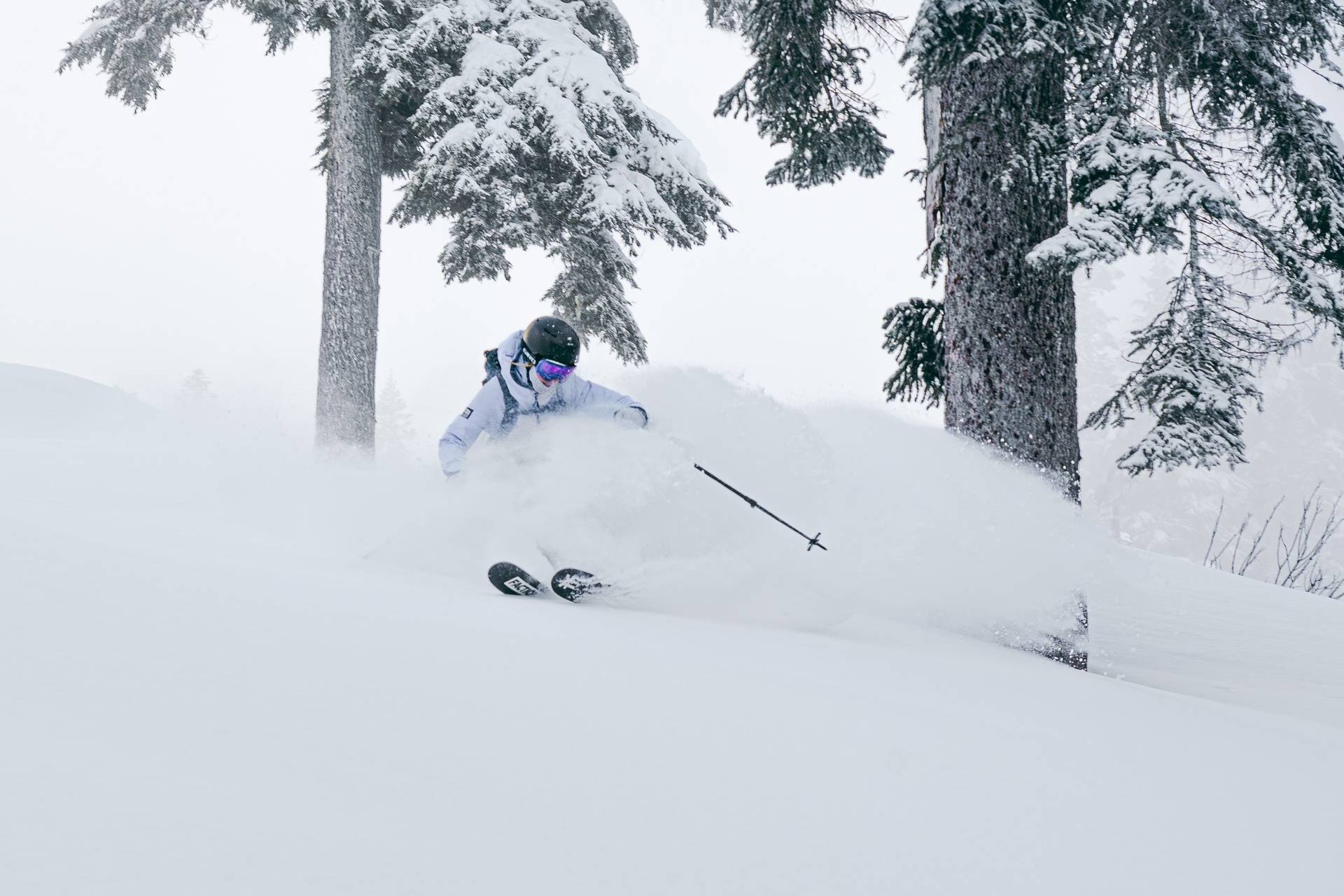 skier in deep pow