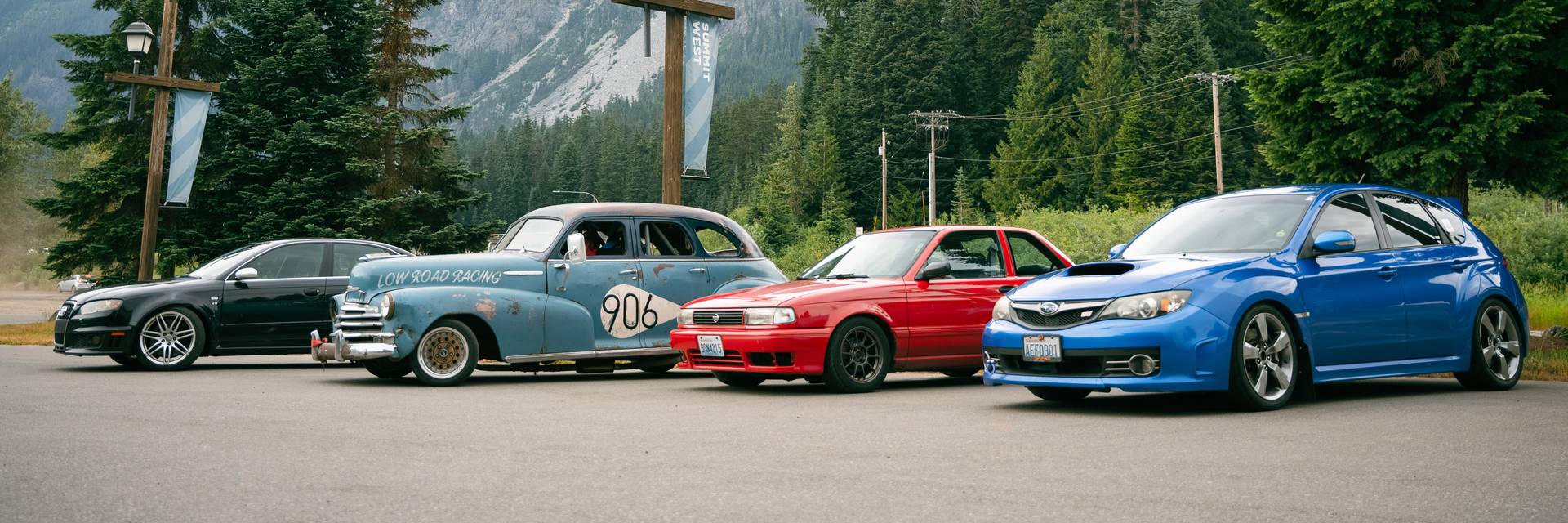cars lined up at Summit West for display at car show