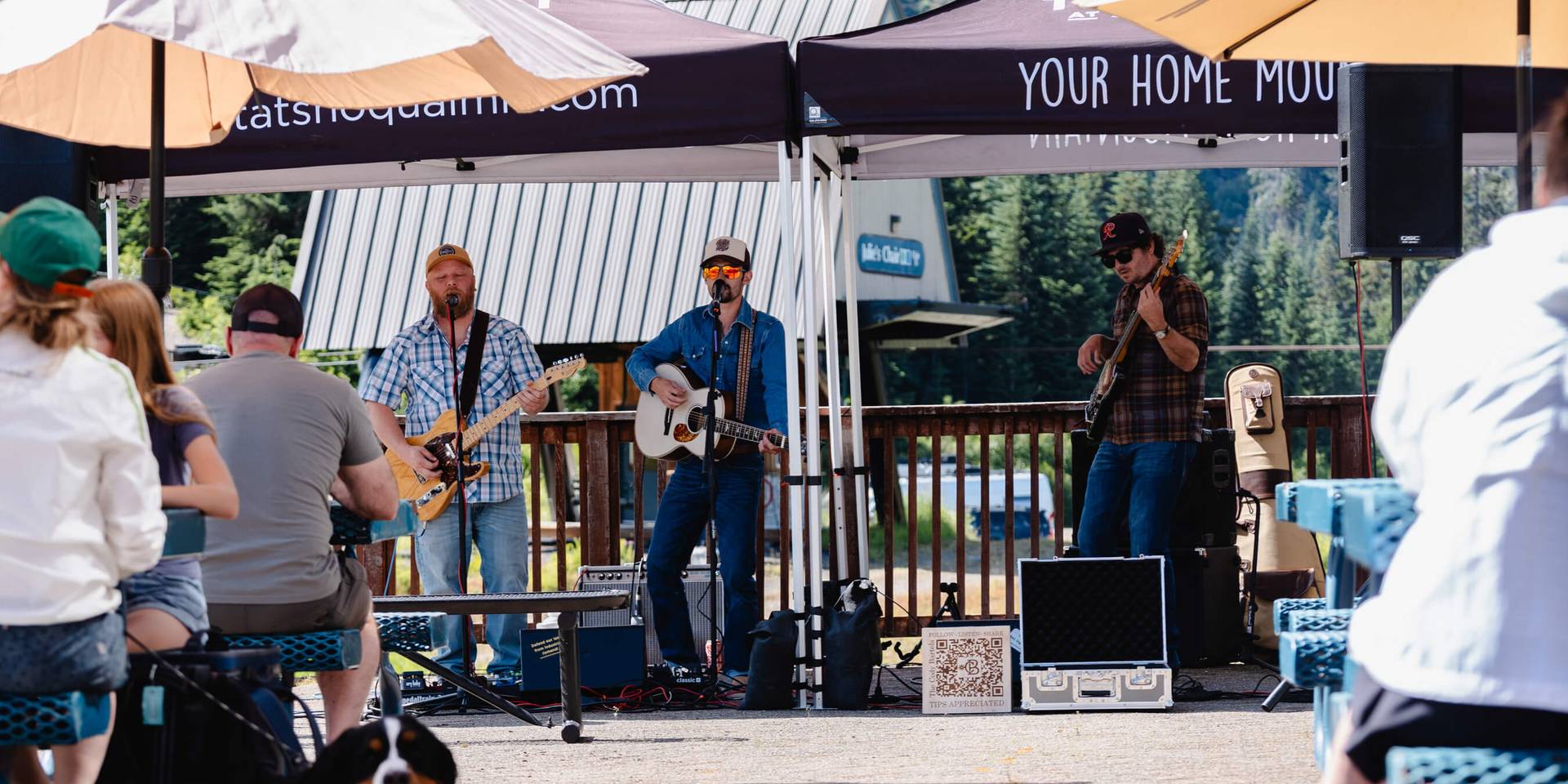 Band playing music outside at Summit West