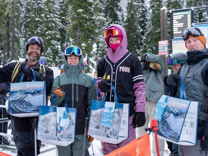 happy guests with first chair prizing Alpental opening day 24-25