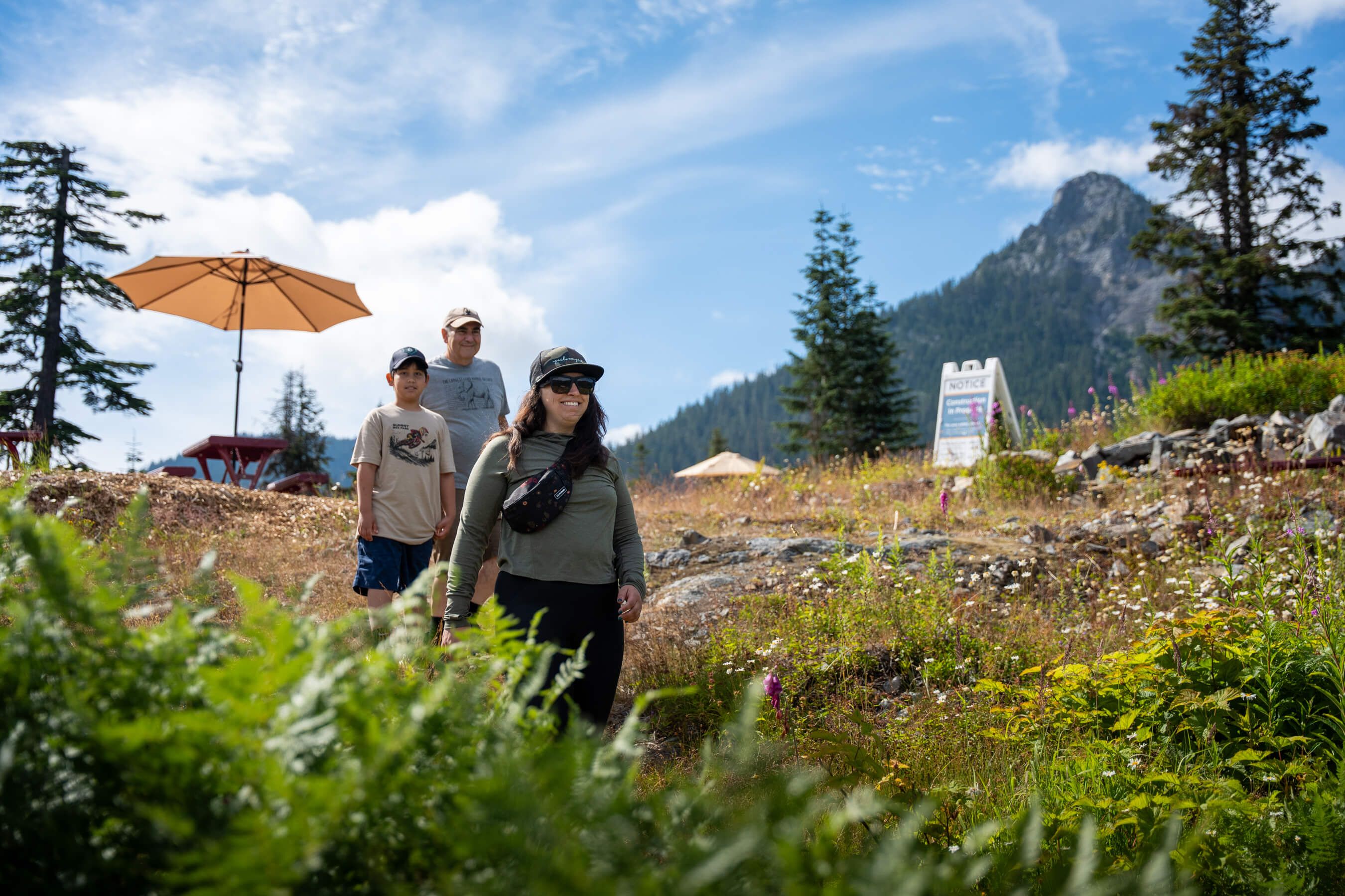 A family of three hiking