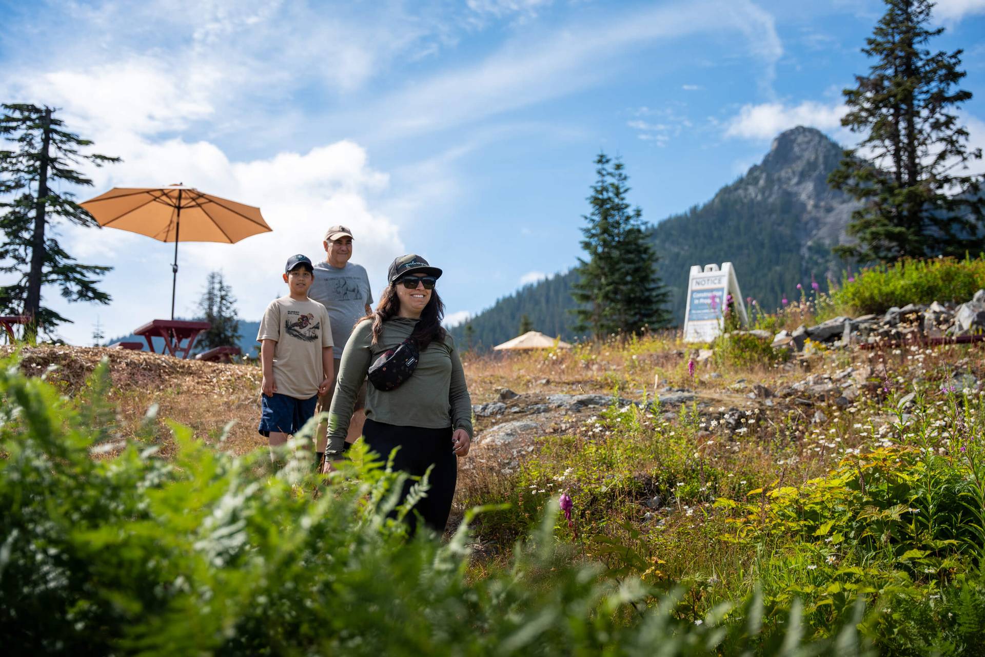A family of three hiking