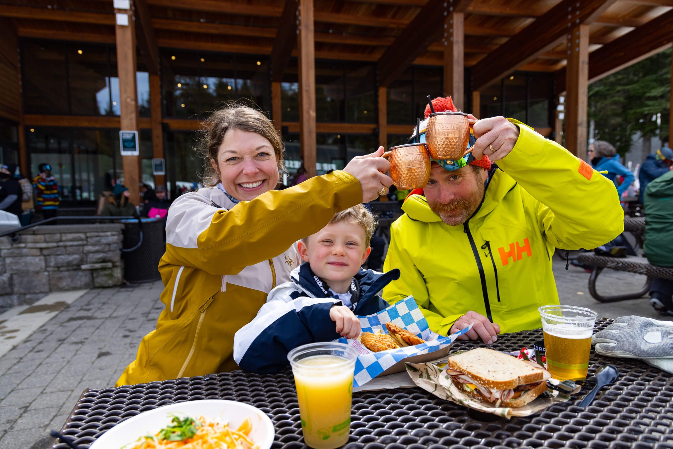 family eating on the plaza at Silver Fir