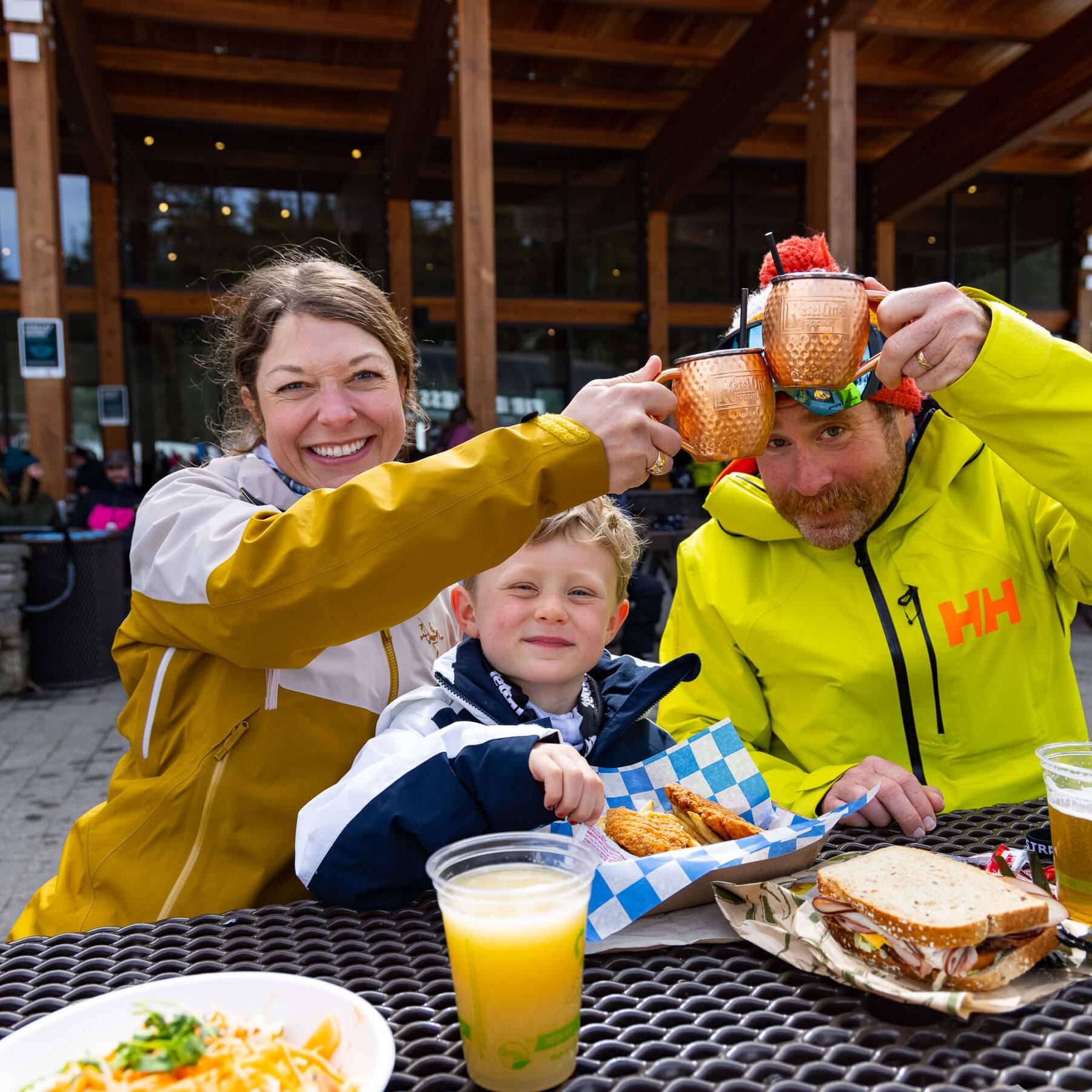family eating on the plaza at Silver Fir