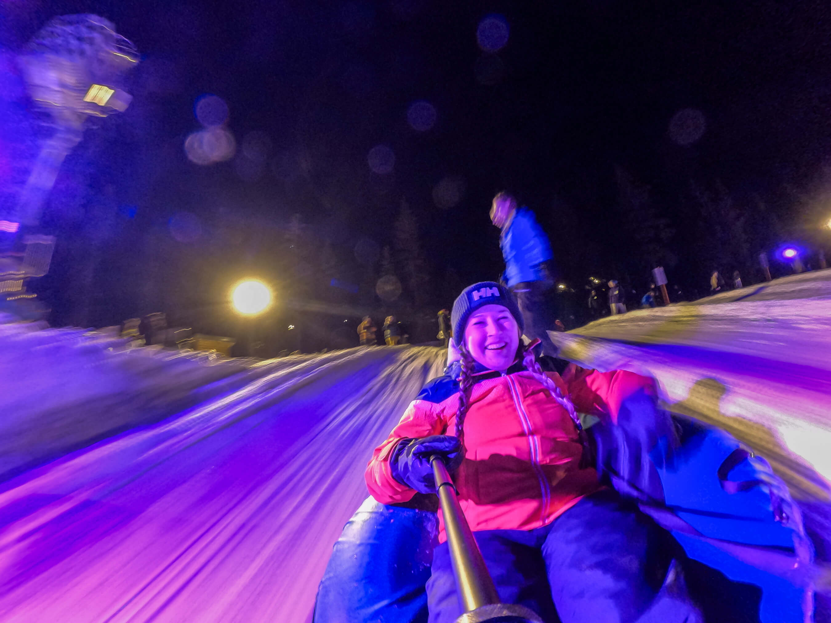 woman night tubing