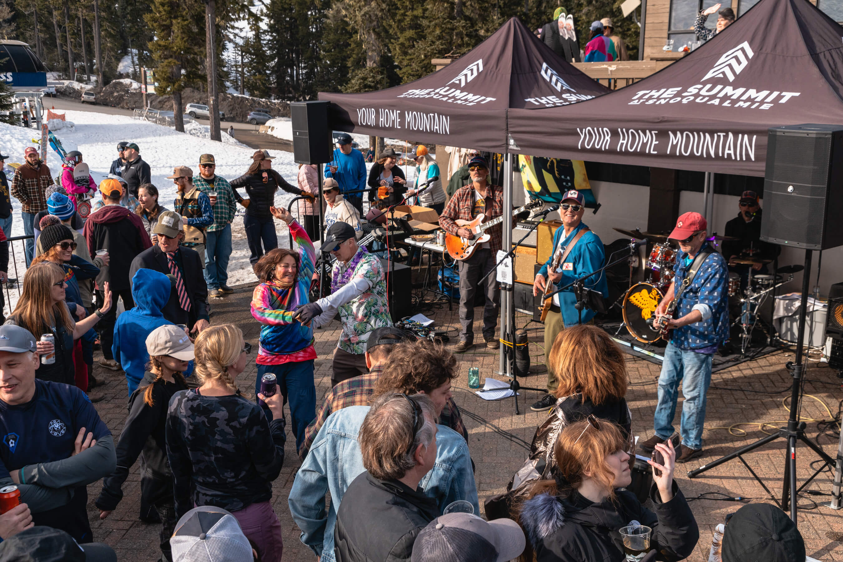 Cockfight Band playing in plaza at Alpental