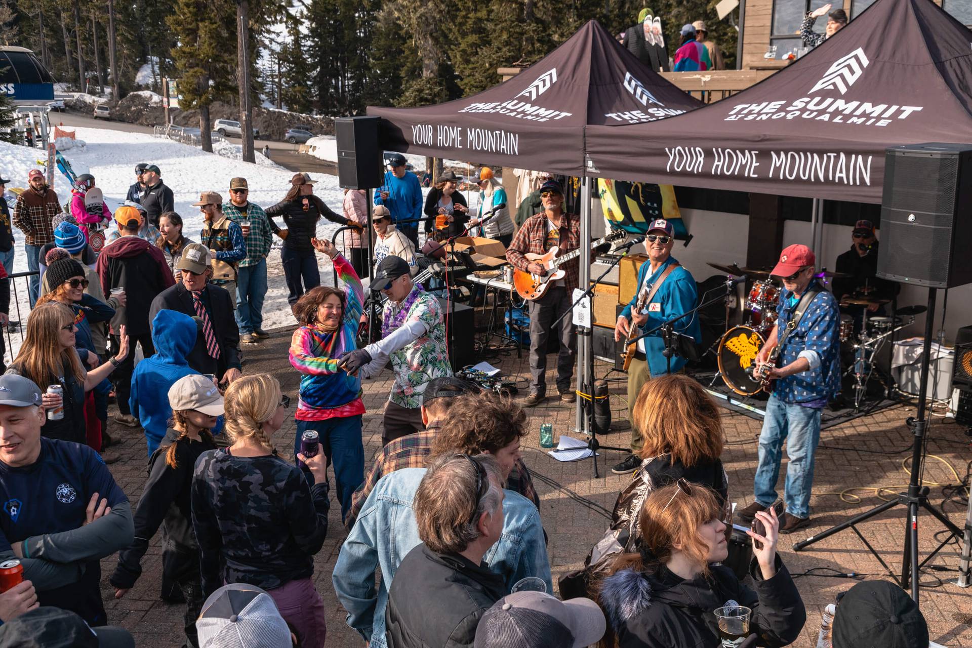 Cockfight Band playing in plaza at Alpental