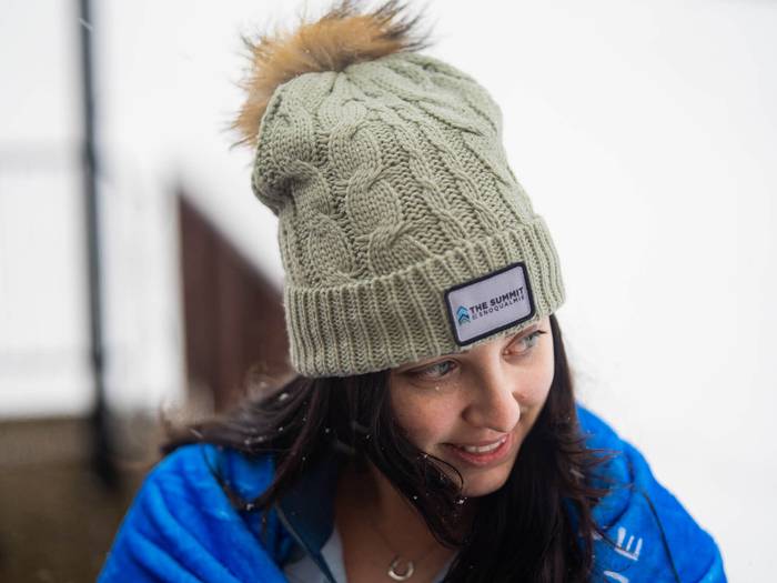 girl wearing summit beanie