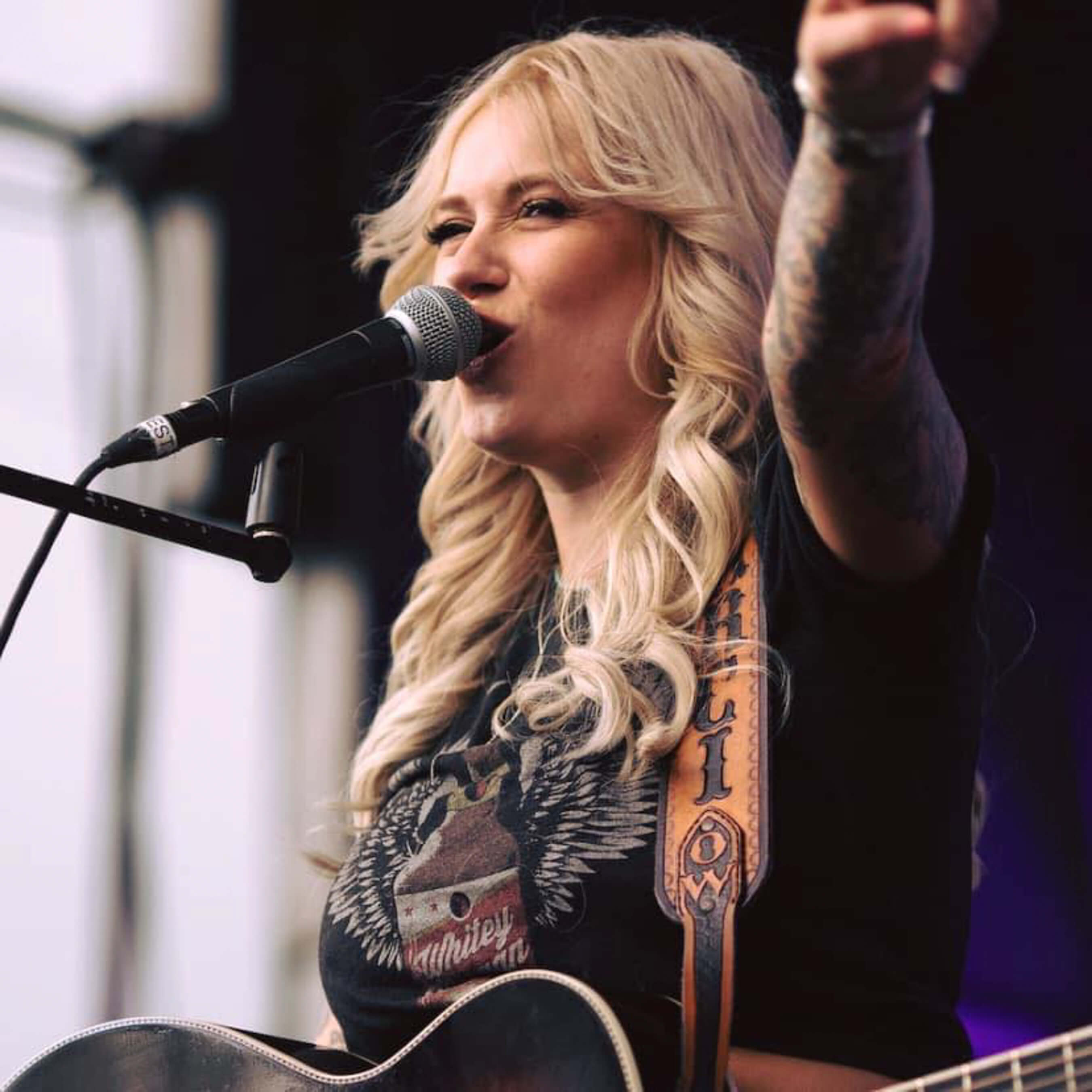 singer Darci Carlson performs on stage