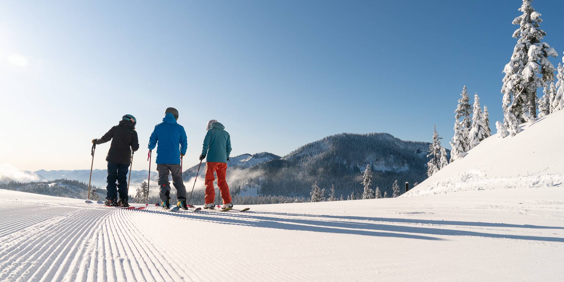 group of skier waiting on a bluebird day