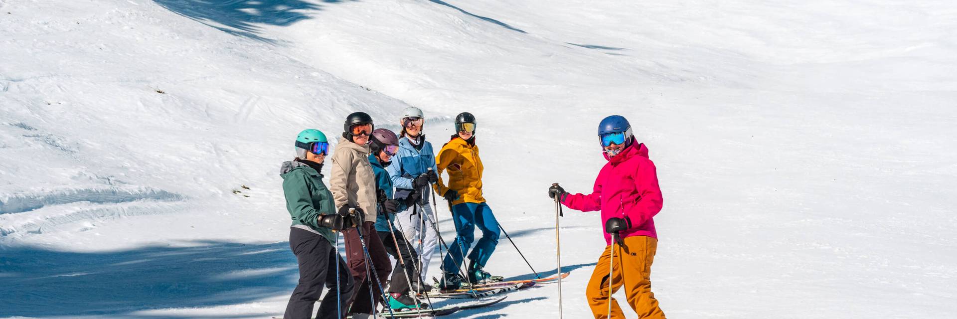 group of clinic participants with coach at Rippin Chix camp