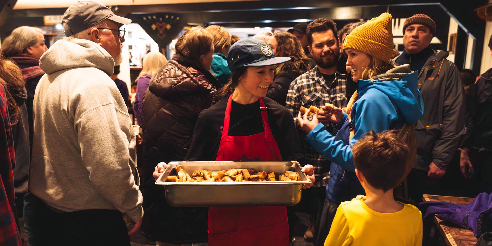 garlic bread being served at Alpental spaghetti feed
