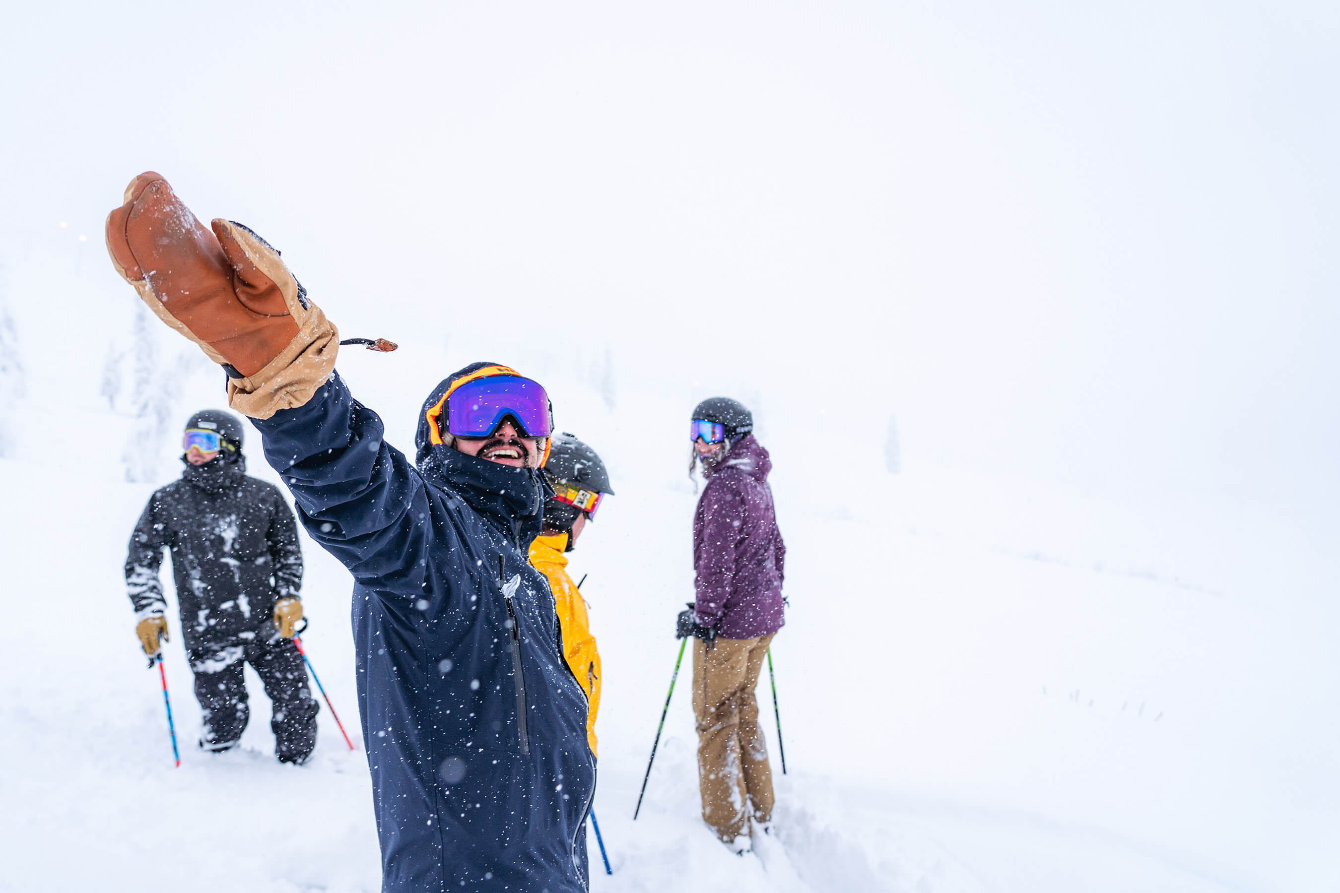 group of skiers and riders