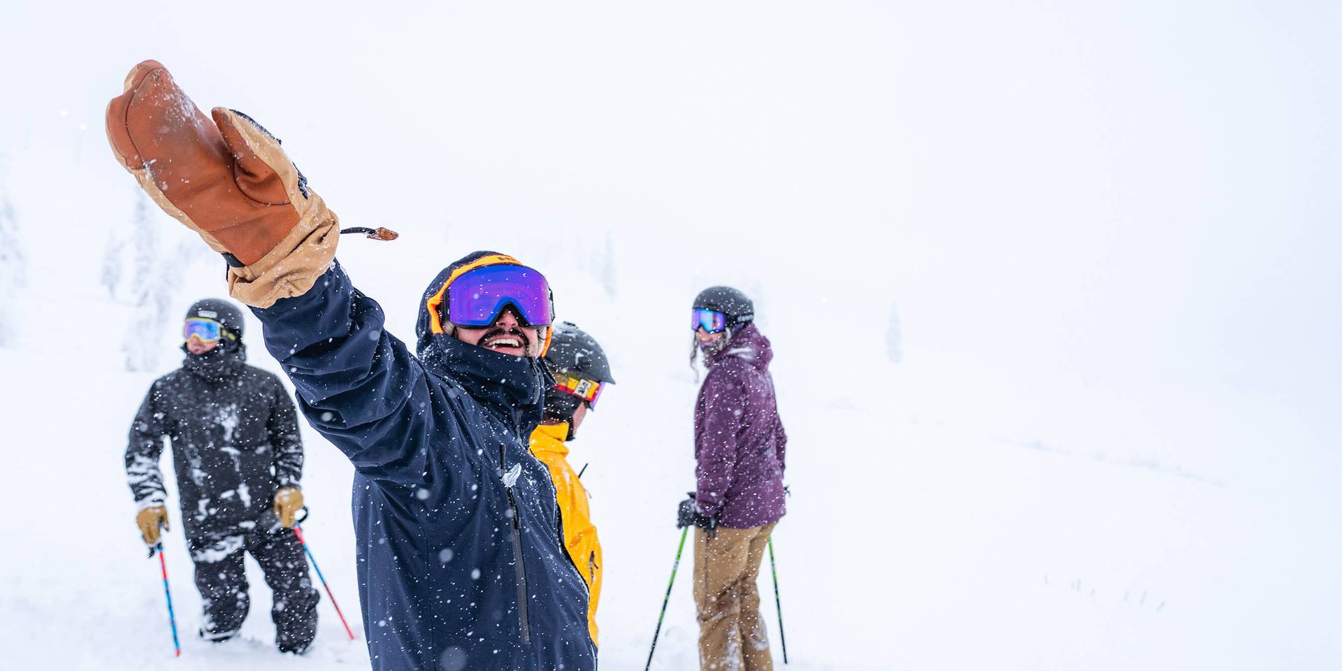group of skiers and riders