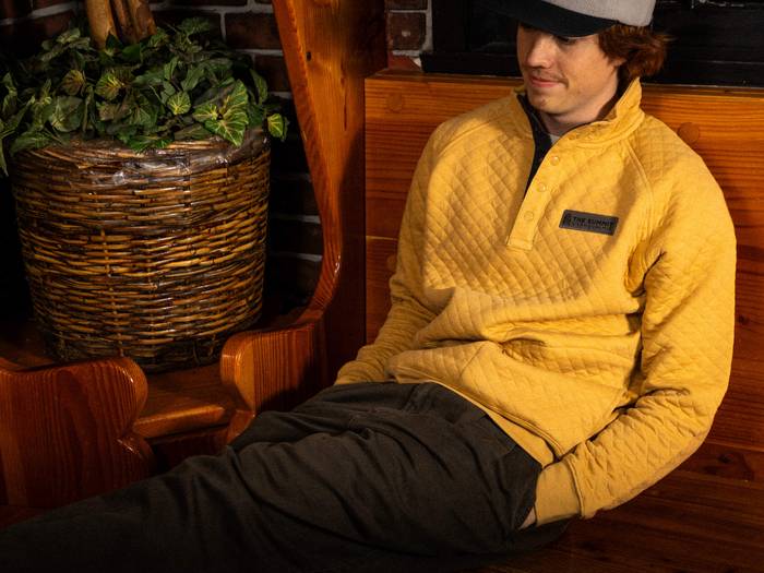 yellow quilted pull over