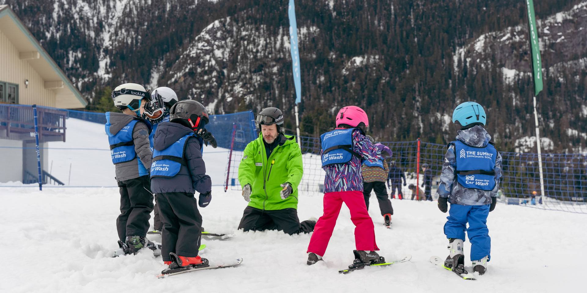 group of young kids in a ski lesson