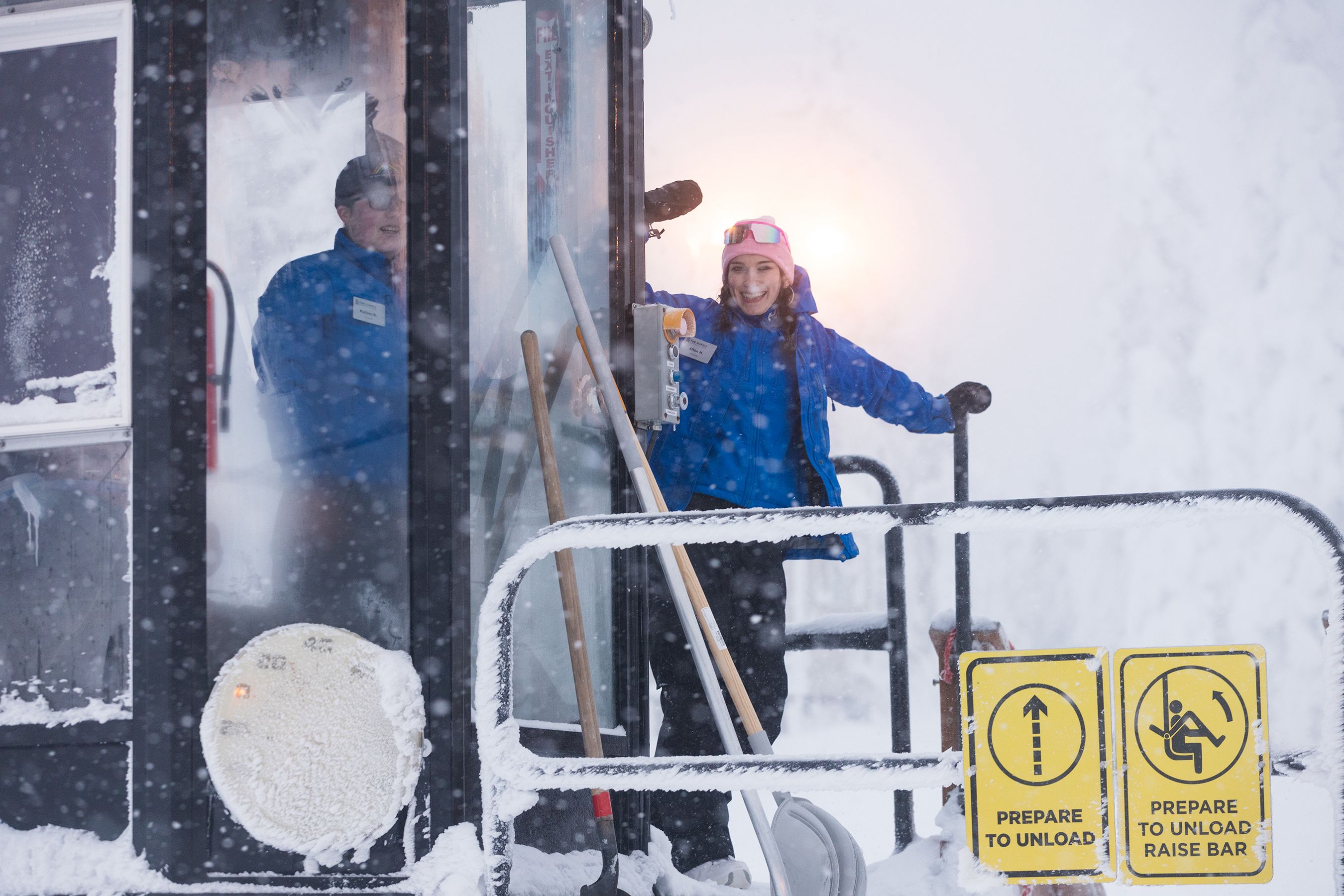 Lift operating smiling and waving