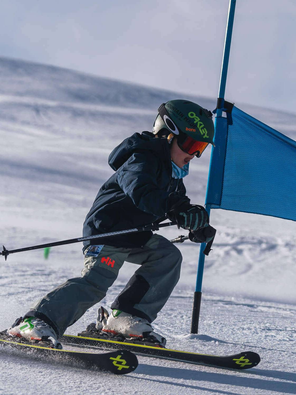 sparc kid sking by gate close up