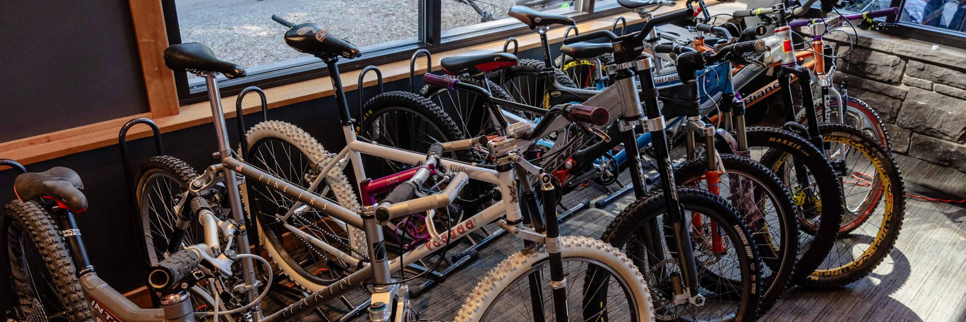 vintage bikes lined up inside Silver Fir Lodge