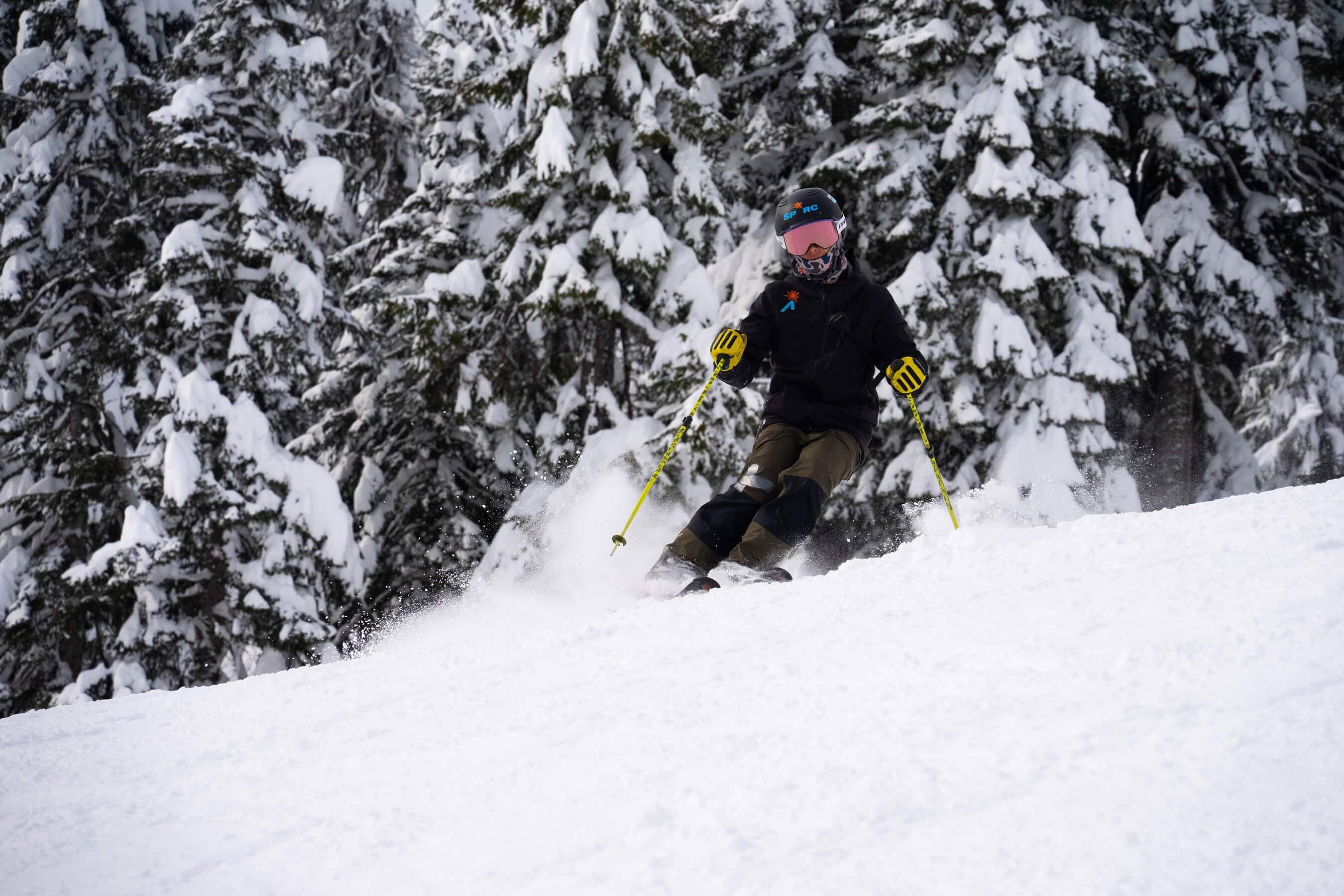skier on groomer