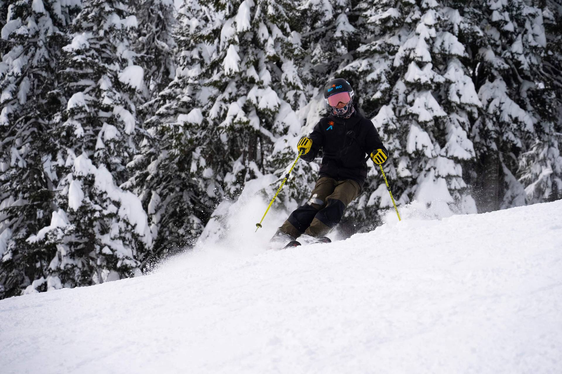 skier on groomer