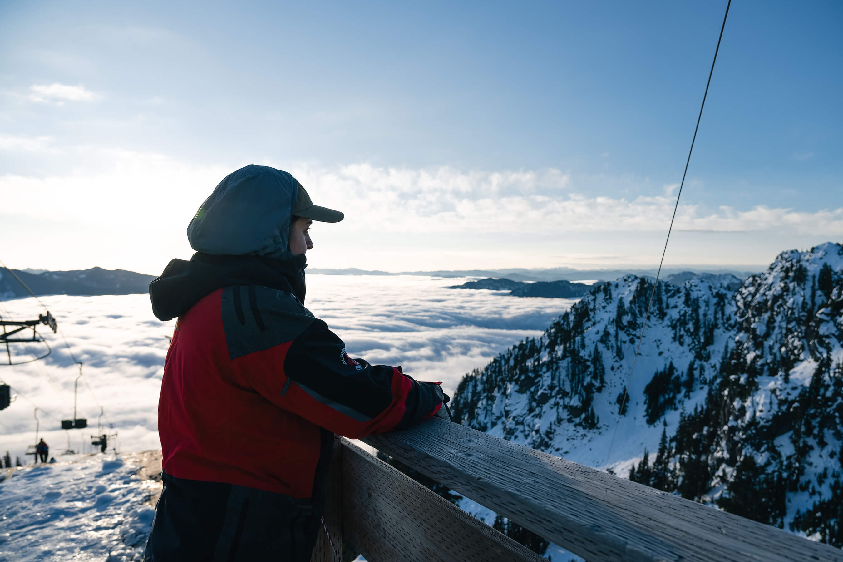 Patroller at the top of the mountain gazing at the view