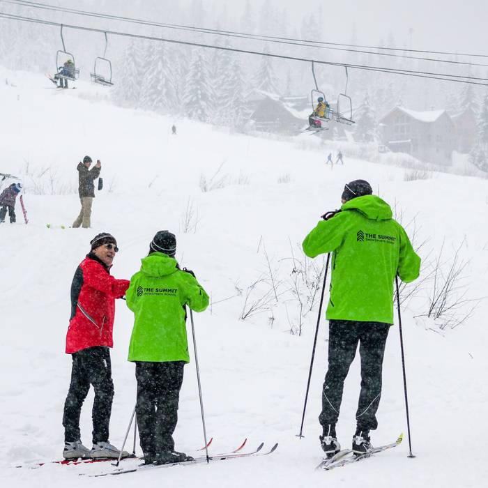 nordic ski instructors with student