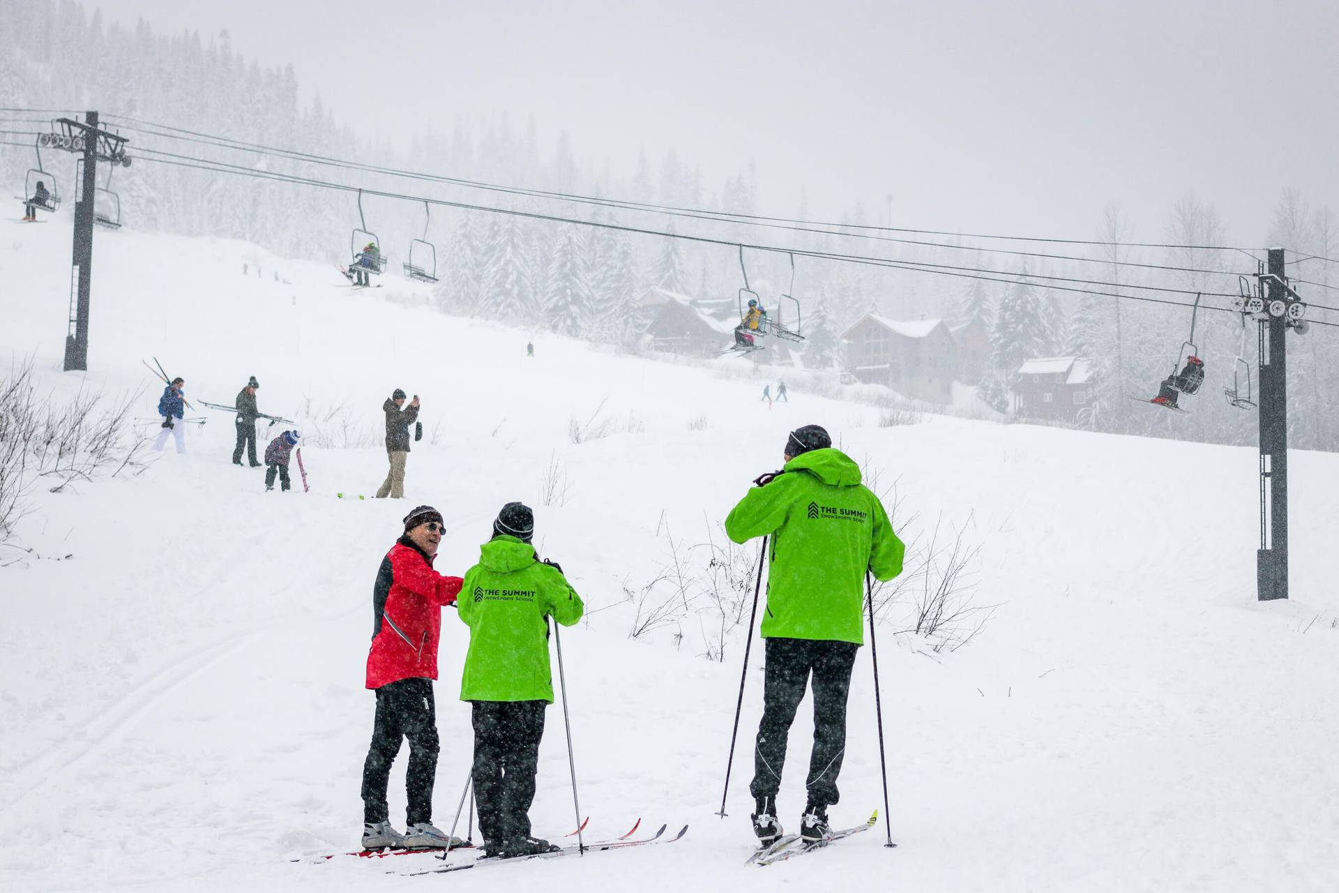 nordic ski instructors with student