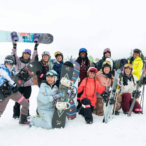 A group of snowboarders gathered at summit central