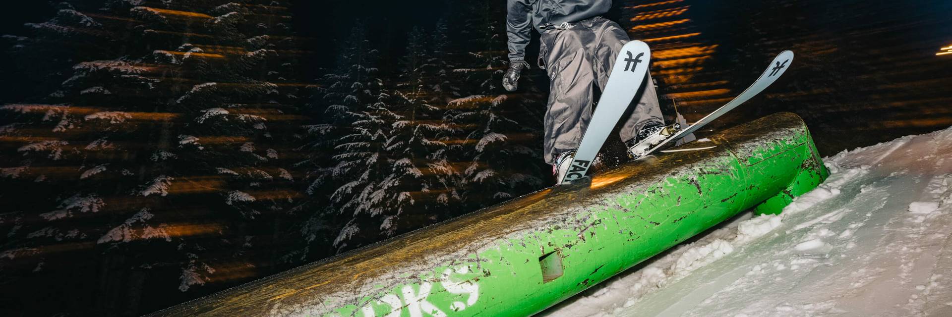 skier on tube at night