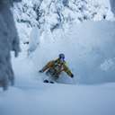 skier in deep pow