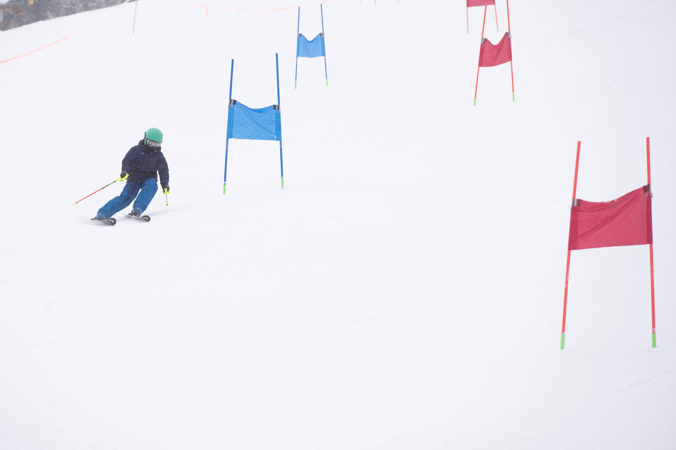 Kid racing between gates
