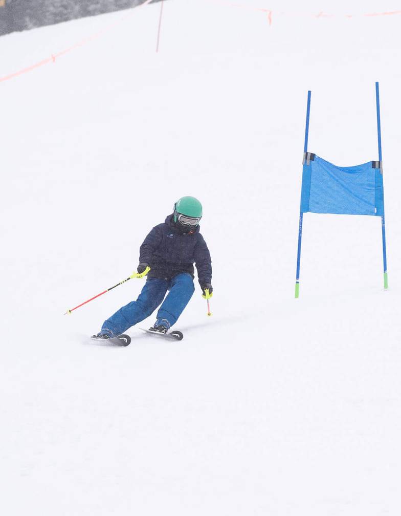 team sparc kid racing through gates