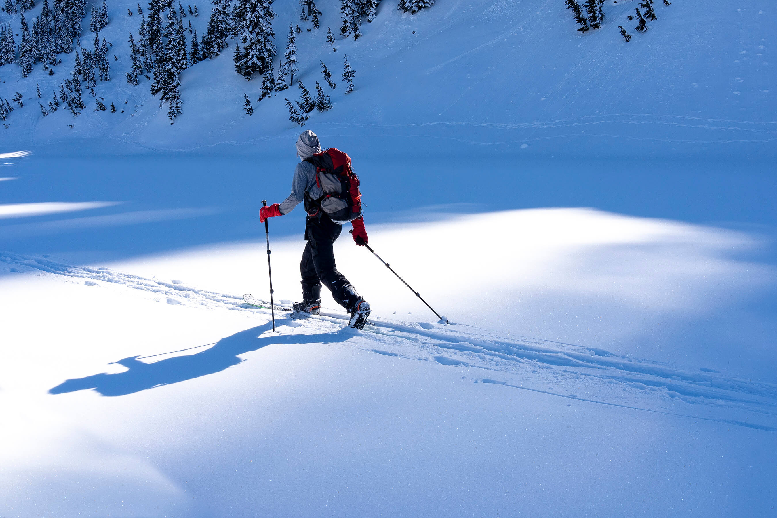 splitboarder touring on flats