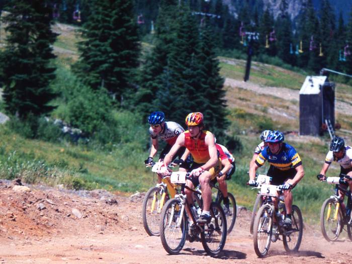 group of world cup mountain bike racers in the 90s