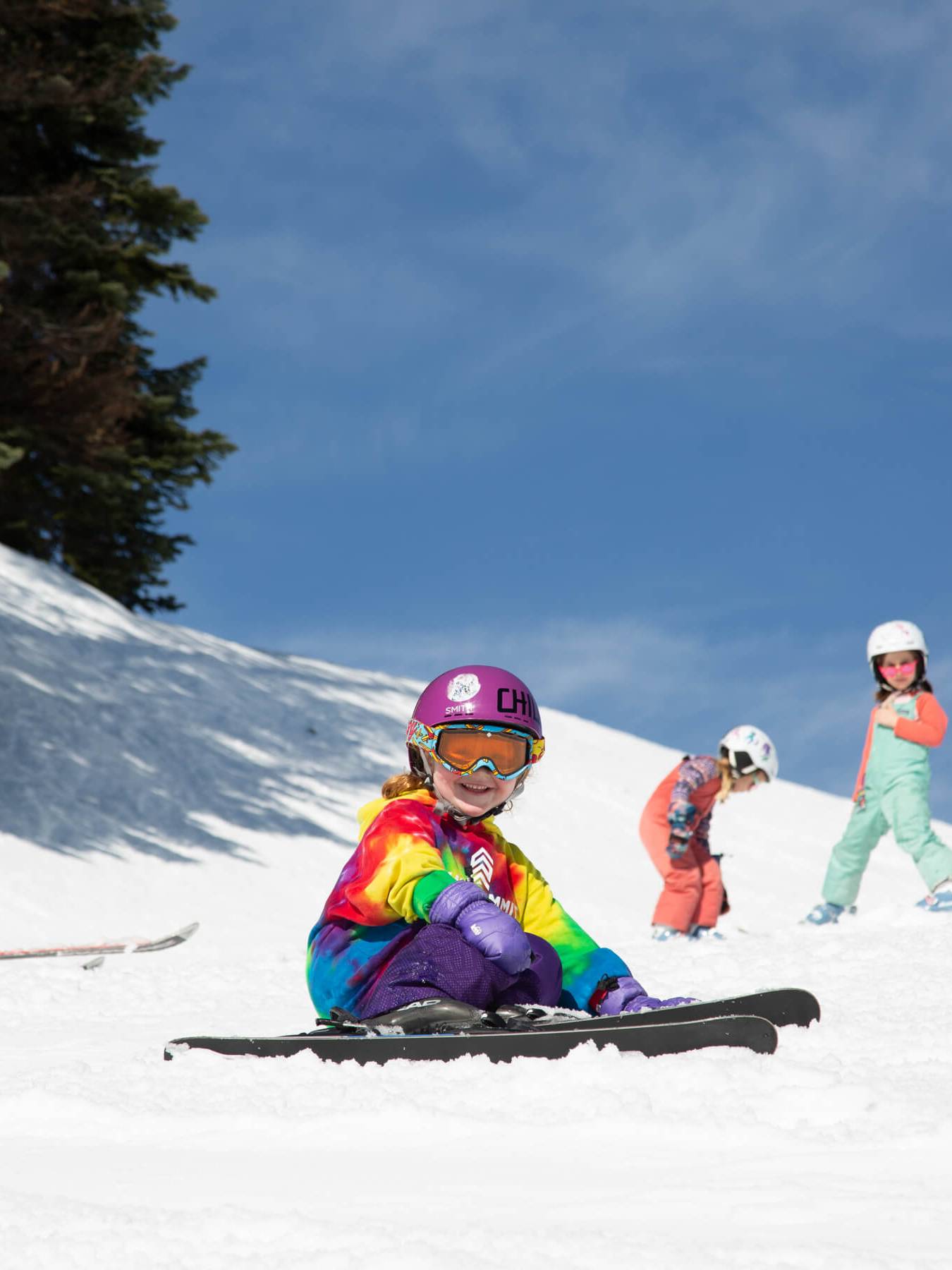 kid resting on snow