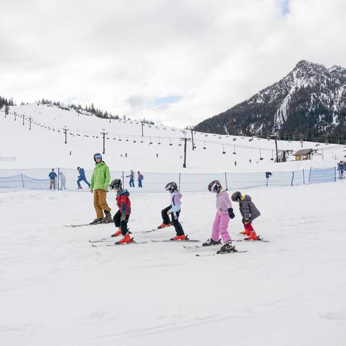 kids learning to ski at The Summit