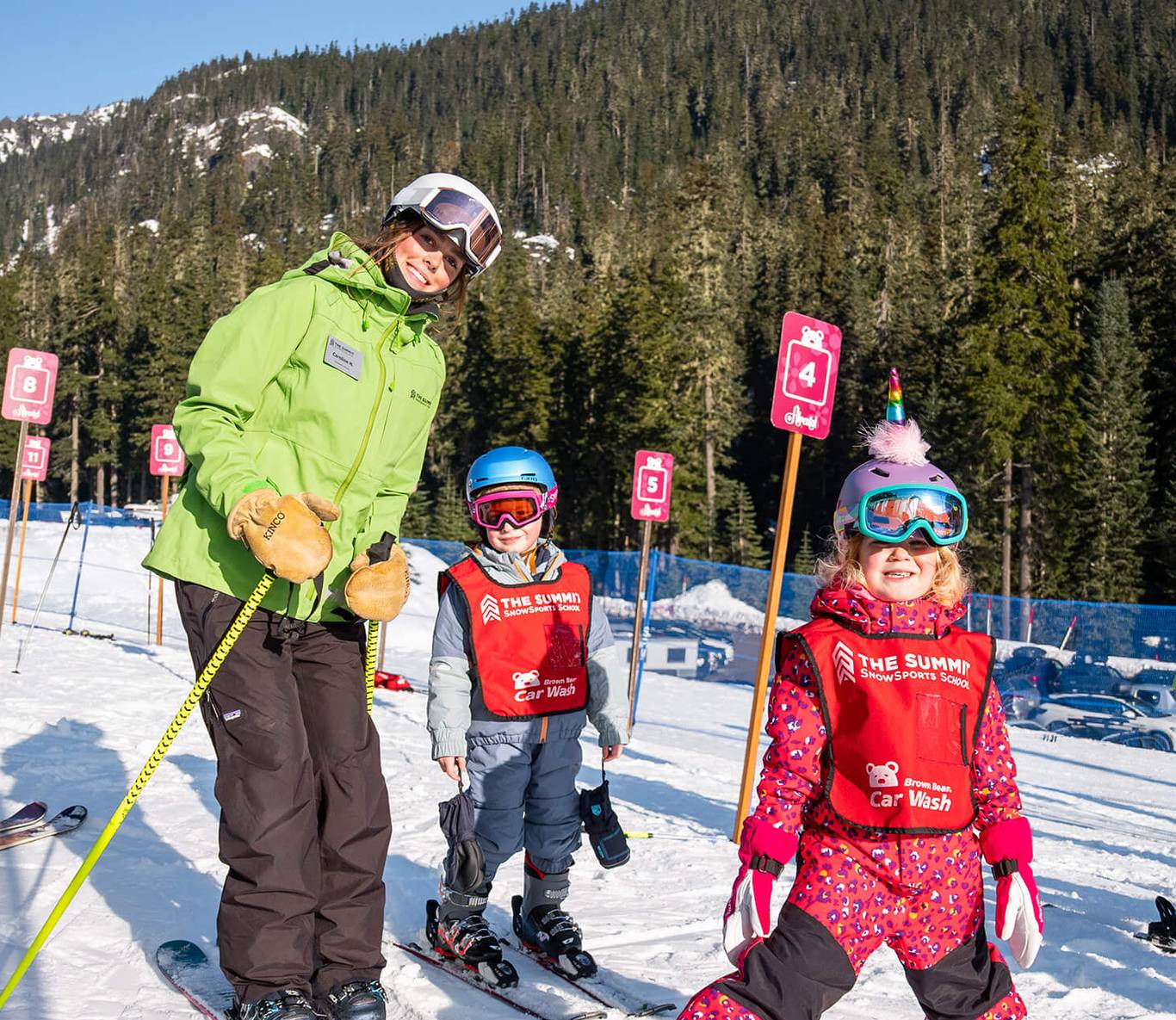 summit leadership student with ski school students