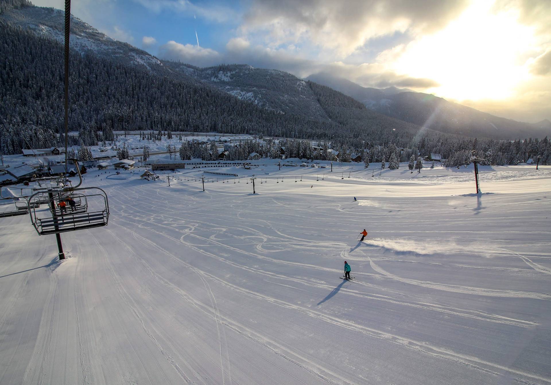 Two lone skiers enjoying fresh groomer at Summit West