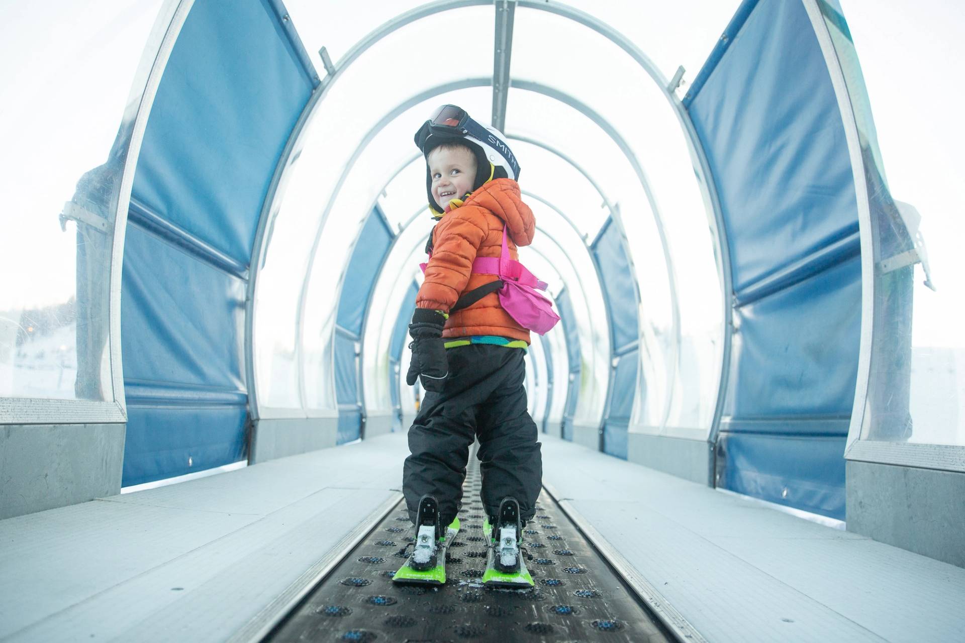 little girl dressed up for ski lessons