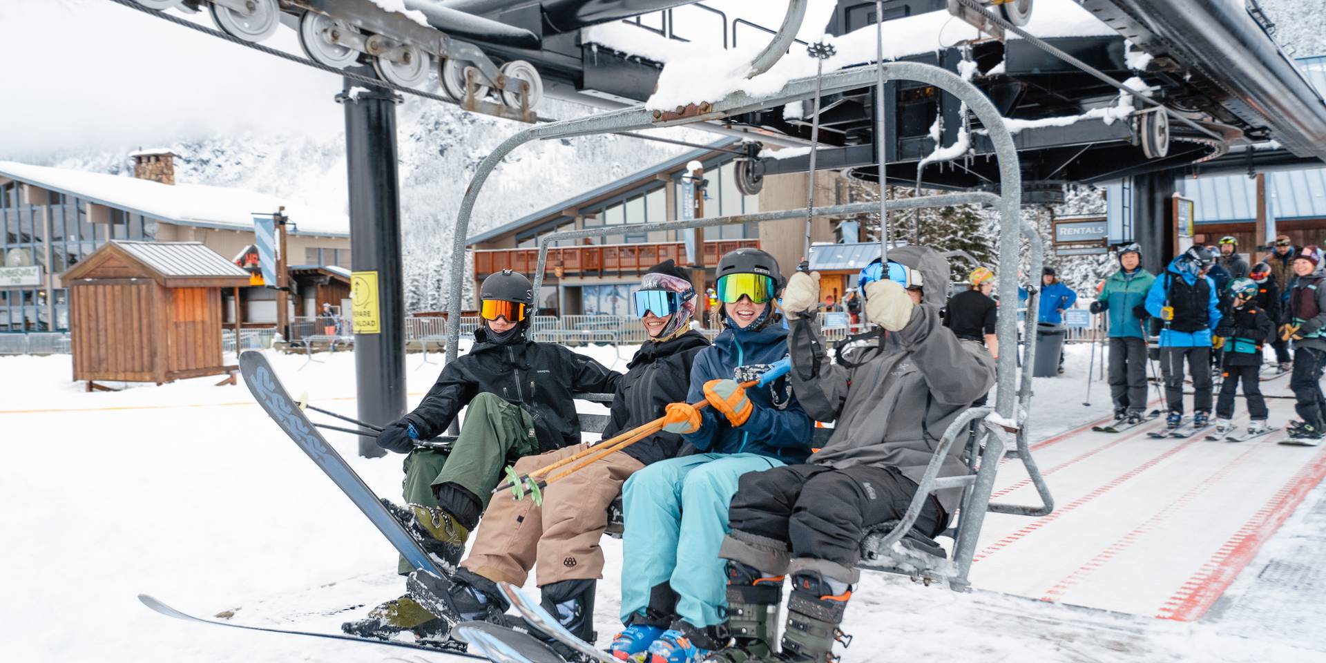 skiers loading lift