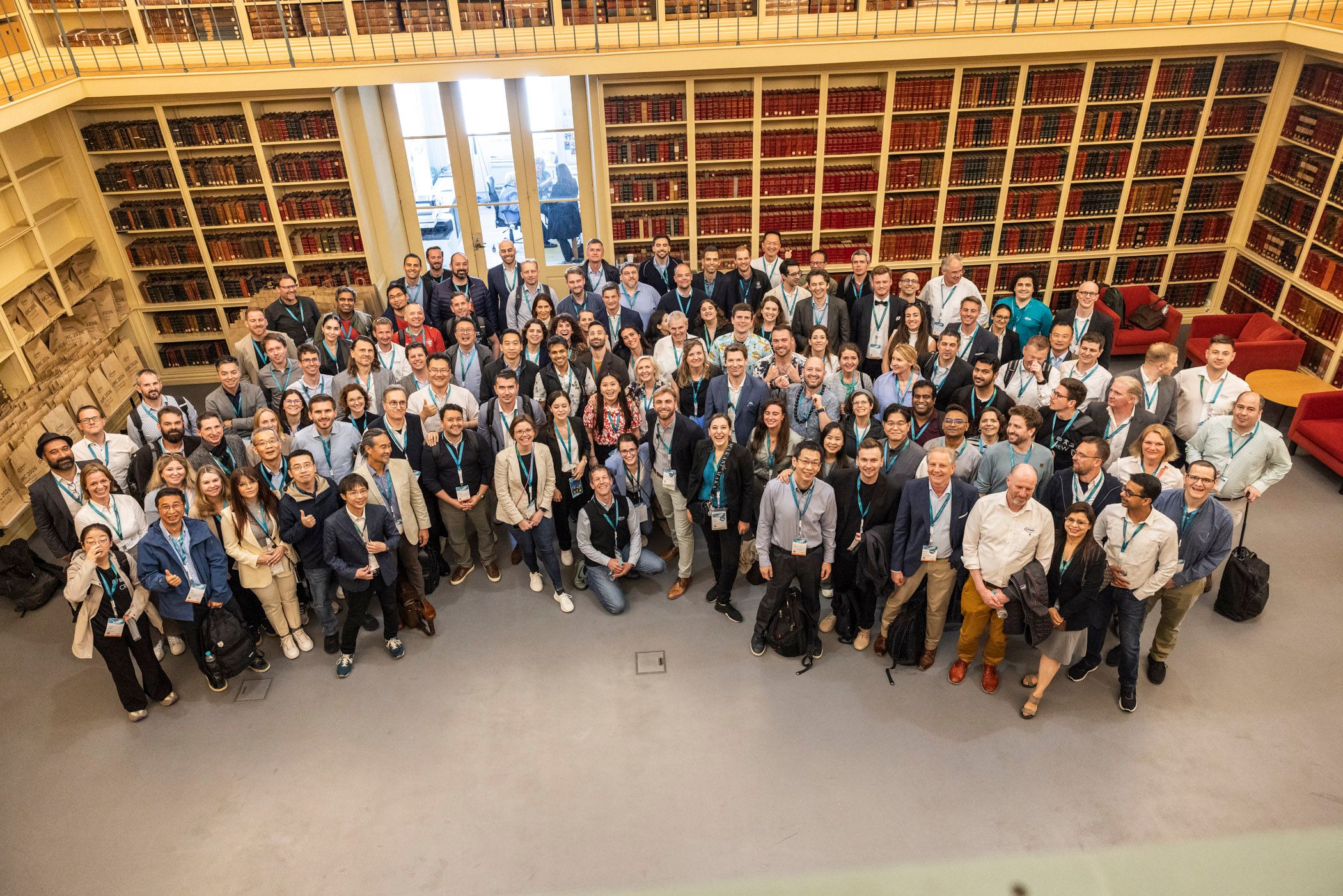 Core event management team standing together behind the scenes at a sales and marketing conference in Porto.