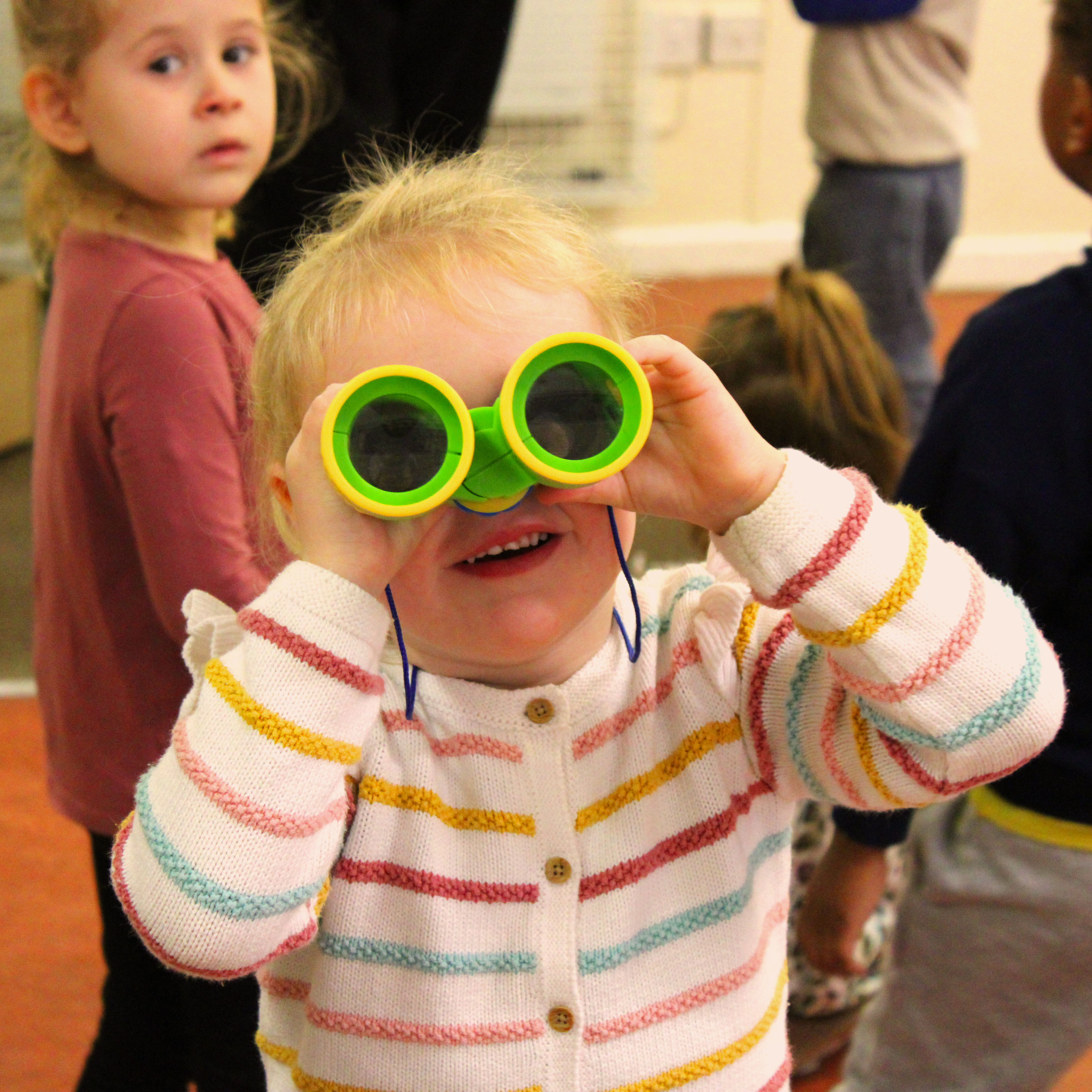 Children learning through a guided sensory activity